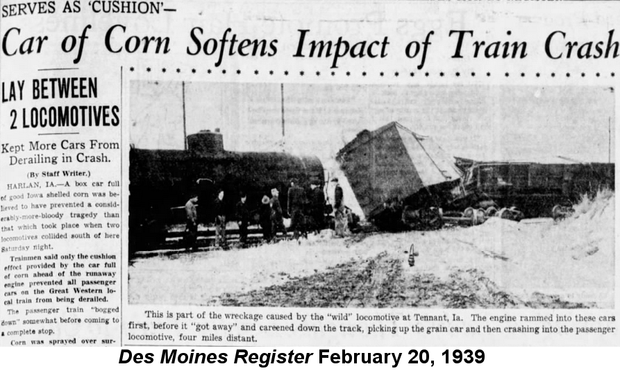 Black and white newspaper story and photo. The headline reads 'Serves as Cushion - Car of Corn Softens Impact of Train Crash'. The photo shows severla men standing in front of a tank car; a boxcar to the right leans at a 45-degree angle partially off the tracks, and another car in the opposite direction behind it. The ground is covered with snow.